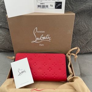 New/Never used Christian Louboutin Wallet!